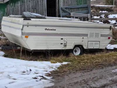 New trailer axle and wheels 3 years ago. Needs some canvas repairs.