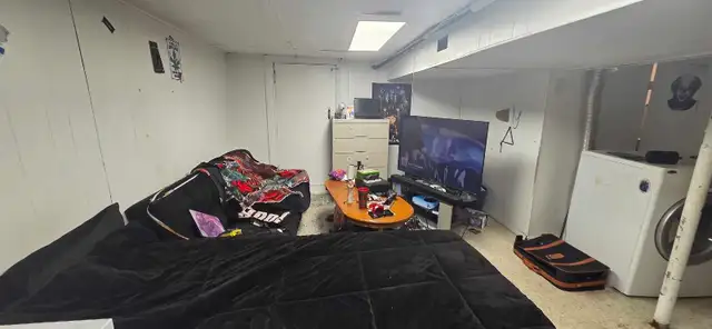 Basement bachelor apartment.