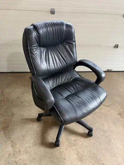 Large, sturdy leather office chair. 29.5 inches at its widest point (armrest to armrest). Height is...
