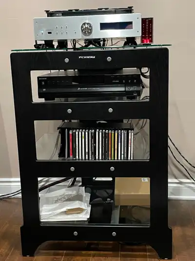 Top notch Audio/video rack/stand for your equipment . Wood and aluminum framework with sturdy temper...