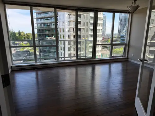 Bright and beautiful condo at great location besides King George Sky train Station Hub and within ea...