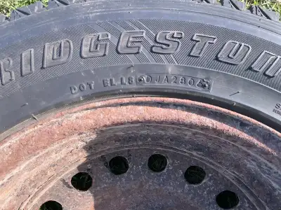 Bridgestone Blizzak set of 4 winter tires and rims for sale. Size is 235/65 R17. Tread depth is 6/32...