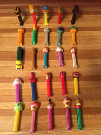 COLLECTABLE TOY PEZ DISPENSERS-25 IN TOTAL