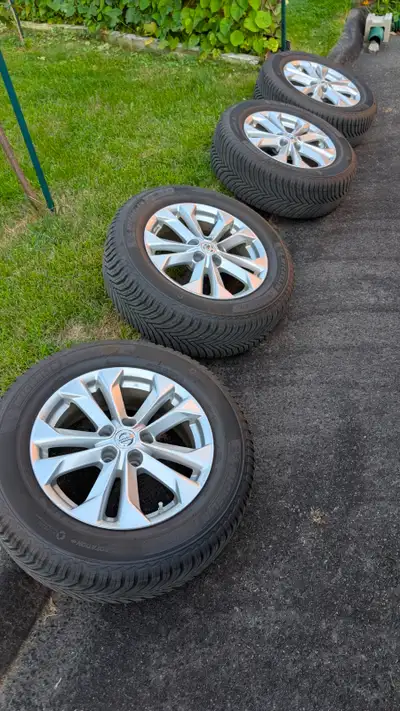 I am selling a set of four original Nissan alloy rims mounted with Michelin CrossClimate tires, size...