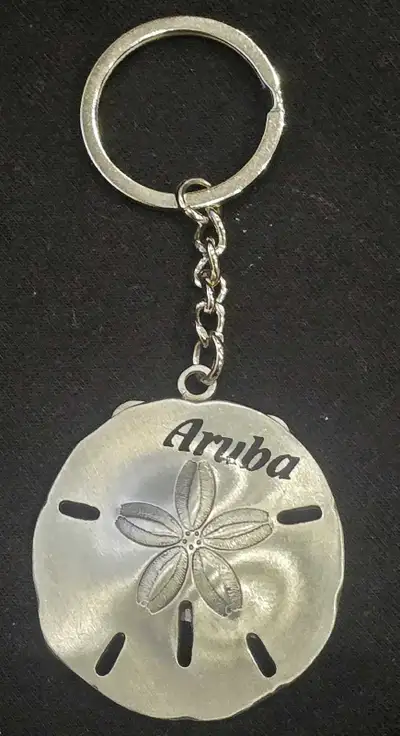 Selling a cute Aruba souvenir keychain! It's brand new! Was a gift. Perfect as a nice reminder of a...