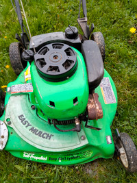 Self propelled gas lawn mower