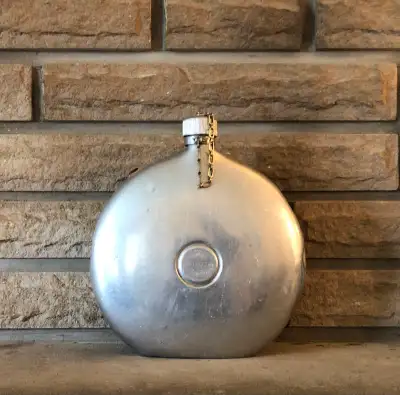 1917-1923: Antique Aluminum Canteen. Intact Cap and Chain, View more