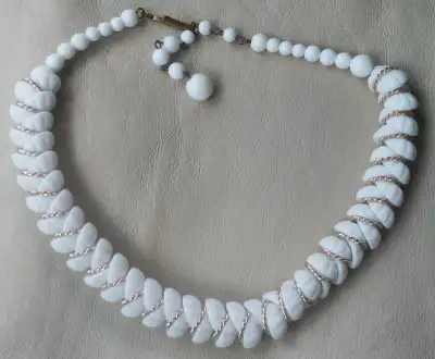 Enjoy all 3 vintage necklaces for $40 or as individually priced. 1. Monet white glass scallop shell...