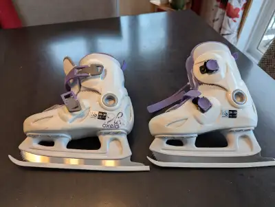 Patins ajustables enfant 18-19, 28-30. En parfait état. À Lorraine.