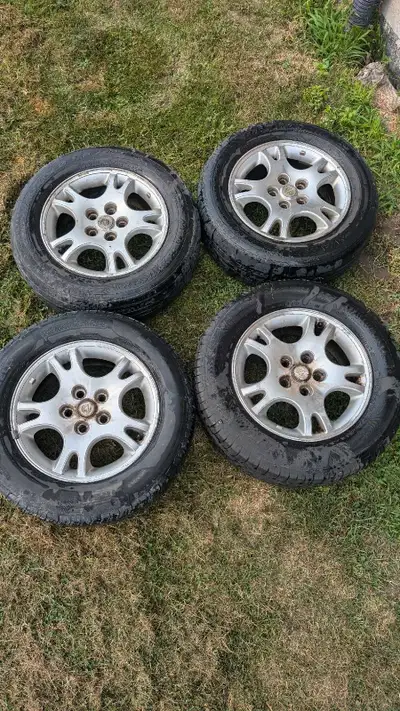4 Dogde aluminum 16" rims 6.5" wide 4 1/4 bolt pattern The tires are no good