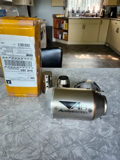 2 brand new unused austin racing motorcycle slip on mufflers bought off aliexpress fits 1 7/8" pipe....