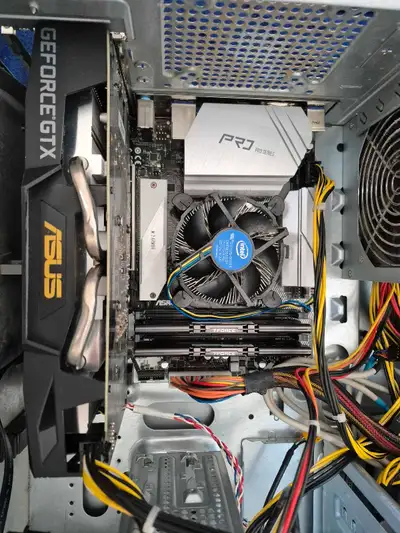 Selling a used custom-built desktop computer featuring an Intel CPU, ASUS GeForce GTX graphics, 16GB...