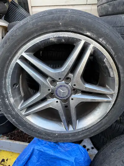 I'm selling a set of used Mercedes AMG rims with a 5-spoke design and a 235/45R18 tire size, perfect...