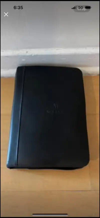 Like new and genuine leather.