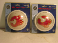 TWO CALGARY FLAMES PRESS LIGHTS