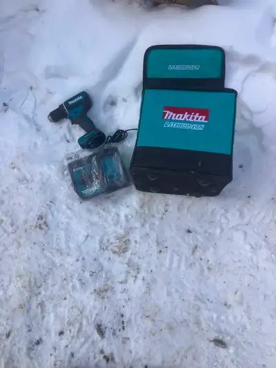 Sold Makita Hammer drill and battery charger, View more