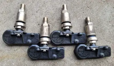 FoMoCo Tire Pressure Monitor Sensors (GenuineFord part). Model# FS5MAF4 Part# DR3V-1A180-CA DR3V-1A1...