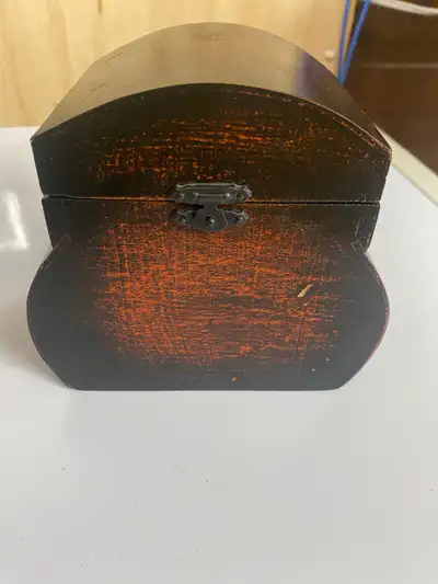 Antique wooden jewelry box with a very unique shape and old patina finish. It is in good condition f...