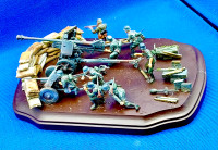 German anti-tank guns and soldiers on wood base  1/35 scale