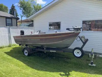 50 hrsp Good shape Runs good New carborator Troll motor Paddles Garmin fish finder Trailer in good s...