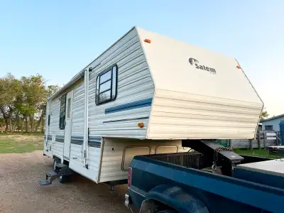 1995 Salem fifth wheel camper for sale. Spacious queen bed room, sink and vanity with sliding door o...