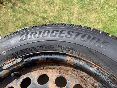 Excellent winter tires. Used 2 winters only. Balanced on rims. With Honda hubcaps. Traded cars and t...