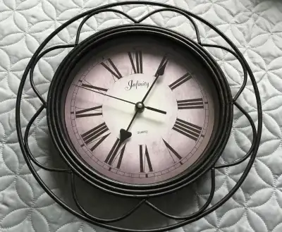 Wall Clock , Battery Operated, 12" in diameter.