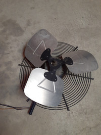 Air conditioner condenser fan motor and blades.