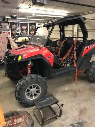 2011 RZR 900XP , 3359 miles, everything has been gone through and is good to ride. Has high lift kit...