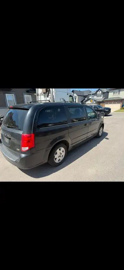 I'm selling my 2013 Dodge Grand Caravan, a reliable minivan with 227355 km on the odometer, perfect...