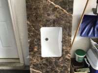 Solid Marble Counter Top with white sink attached
