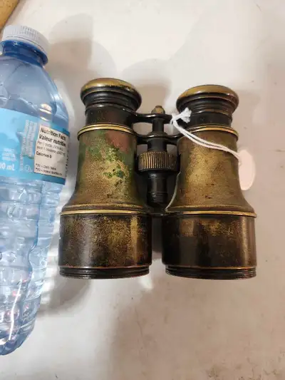 These are vintage opera glasses with a unique antique look, perfect for collectors or theatrical ent...
