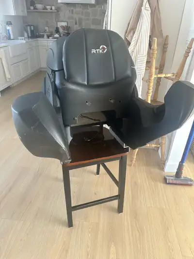 Snowmobile seat for passenger with heater hand warmers. Also has storage compartment. Purchase but u...