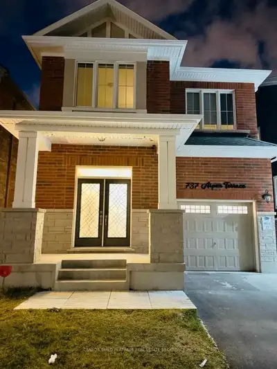 Elevated, light-filled, four-bedroom, three-bathroom open concept The kitchen features top-of-the-li...