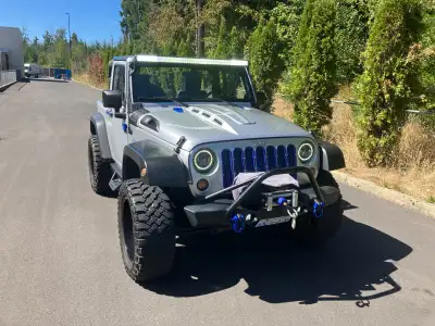 Hardtop,automatic trans. upgraded led lights, full width light bar above windshield,custom upholster...