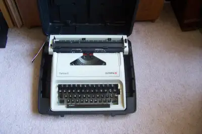 Vintage Olympia Carina 2 Typewriter. An old typewriter but looks and operates like new. Extra large...