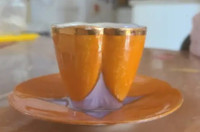 Tiny tea cup and saucer