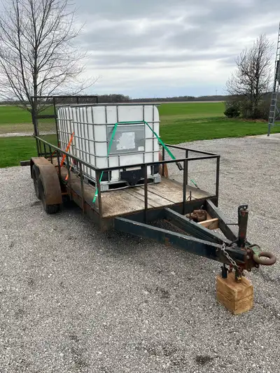 Tandem axle utility trailer Deck is 5X14ft Heavy duty built trailer, has torsion bar suspension on t...