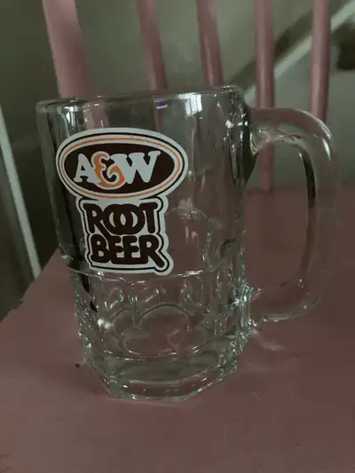 This is an A&W Root Beer mug perfect for enjoying your favourite soda; in used condition, please see...