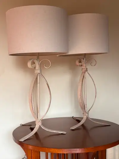 Matching lamps with neutral linen shades., View more