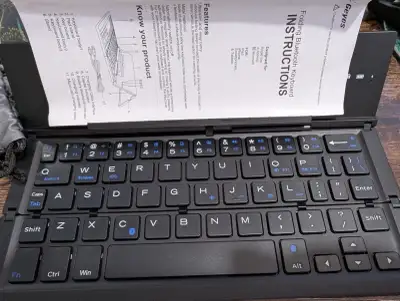 Small Portable Bluetooth Keyboard Folds up for Transport, View more