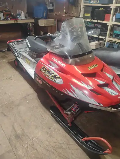 Good running polaris rmk 800 snowmobile, 141 track. Asking 2000 obo located in Hudsons Hope