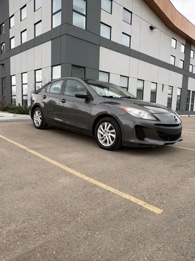 2012 Mazda 3 gx 4 door 2.0 engine 5speed automatic 204 000km with lots of life left New windshield,...