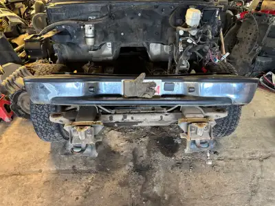 I have a decent rear bumper off of a 2006 Chevy Avalanche. Has one little dent as shown in picture,...