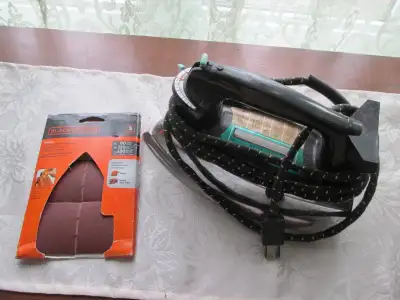 vintage Iron in working condition with sandpaper