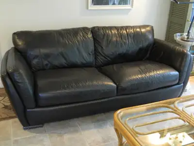 This large leather sofa has been in my family since new, but we no longer need it. Natuzzi top quali...