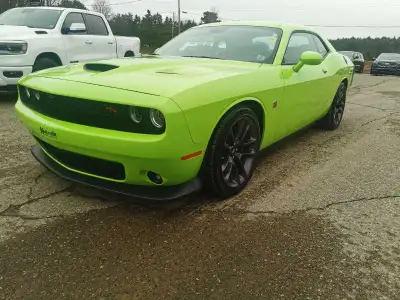 2023 Dodge Challenger Scat Pack 392 Engine: 6.4L SRT HEMI V8 Transmission: 8Speed Automatic Features...