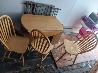 Table with fold down side with 3 chairs , View more