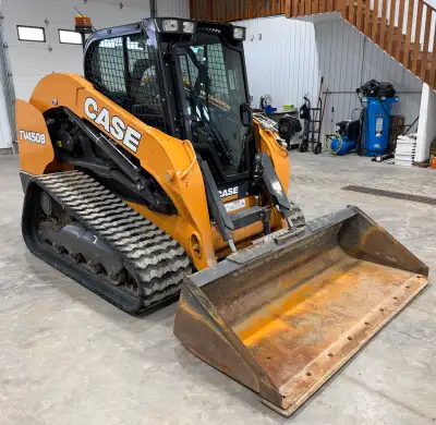 17.7” tracks Showing 1029 hours EH controls 2 speed Ride control Self leveling Cab w/Heat, A/C, Radi...