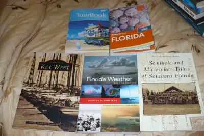 florida travel books, like new condition $5 each